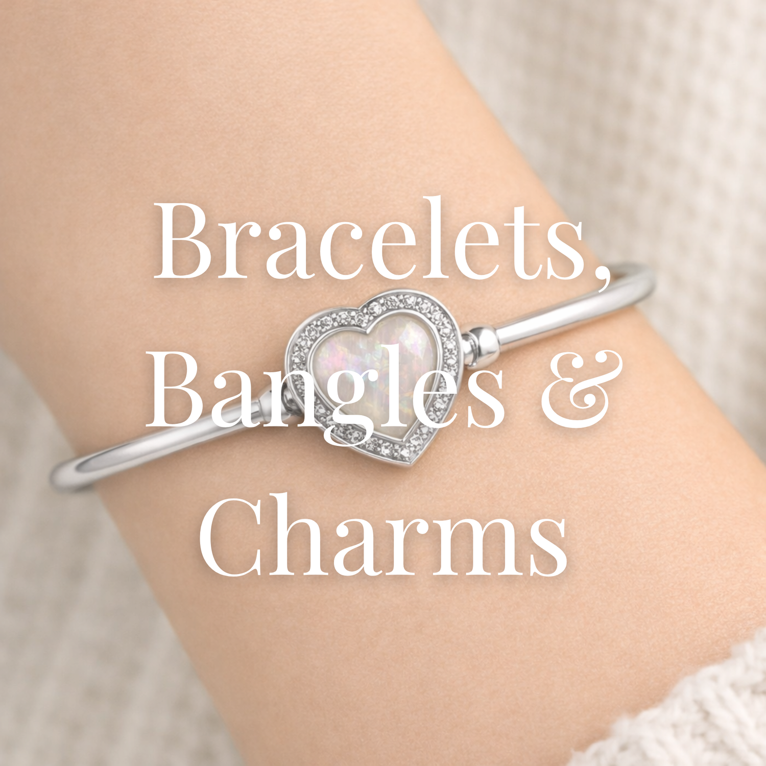 Keepsake bracelets, bangles and charms collection featuring handcrafted sterling silver jewellery personalised with breastmilk, cremation ashes, hair and flower inclusions.