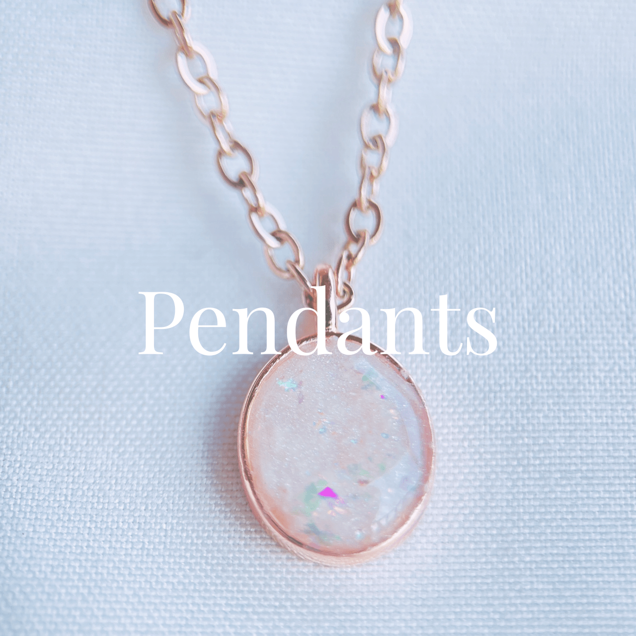 Keepsake pendant collection featuring handcrafted personalised memorial and breastmilk jewellery pendants.